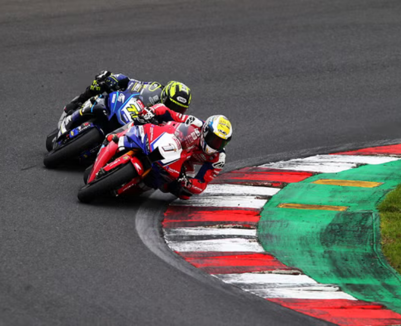 image of a motorbike racing another motorbike for our Motor Sports page 